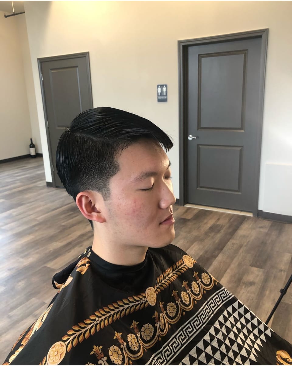 Side-swept haircut in the chair