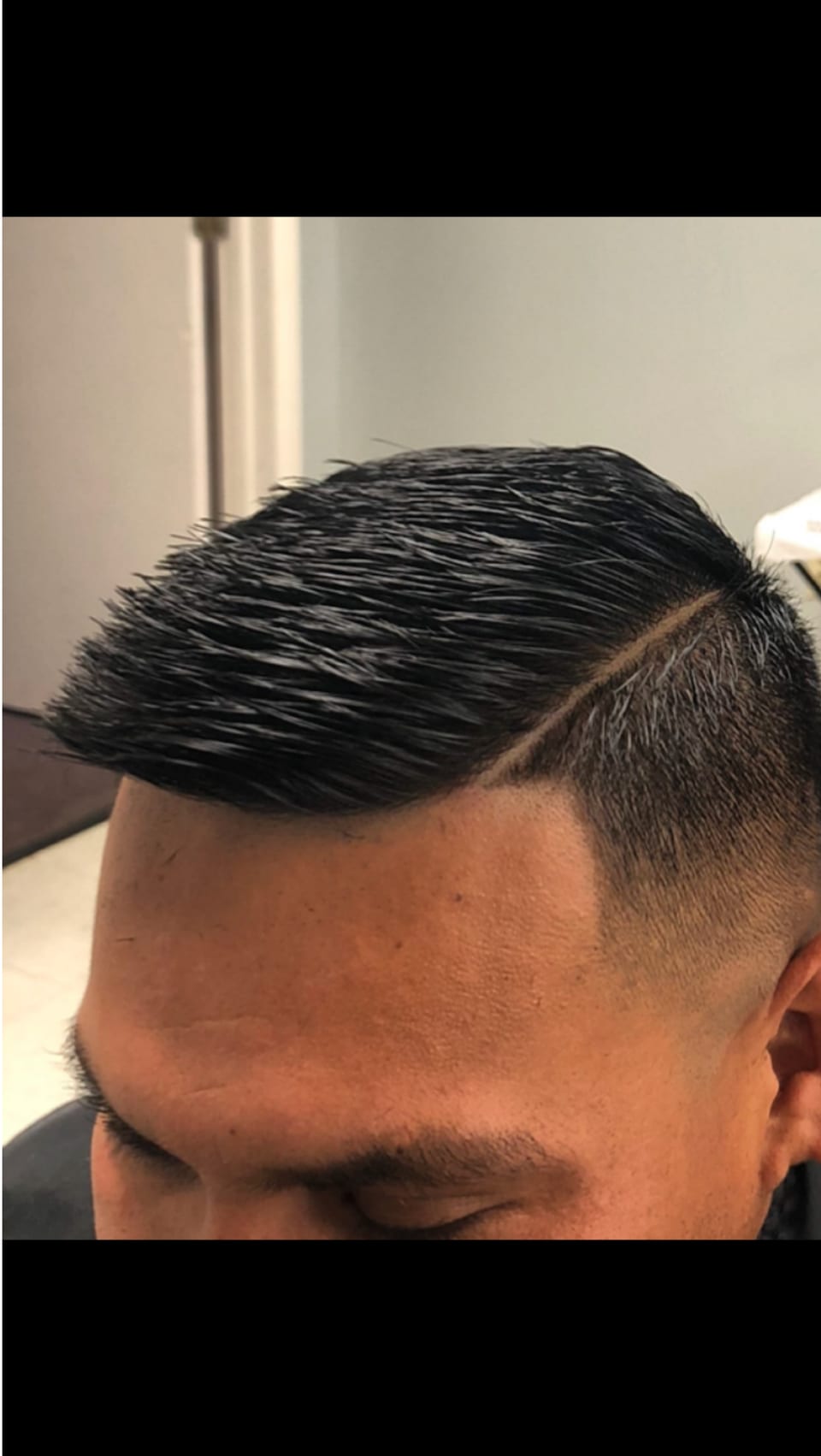 Tight side part haircut finish