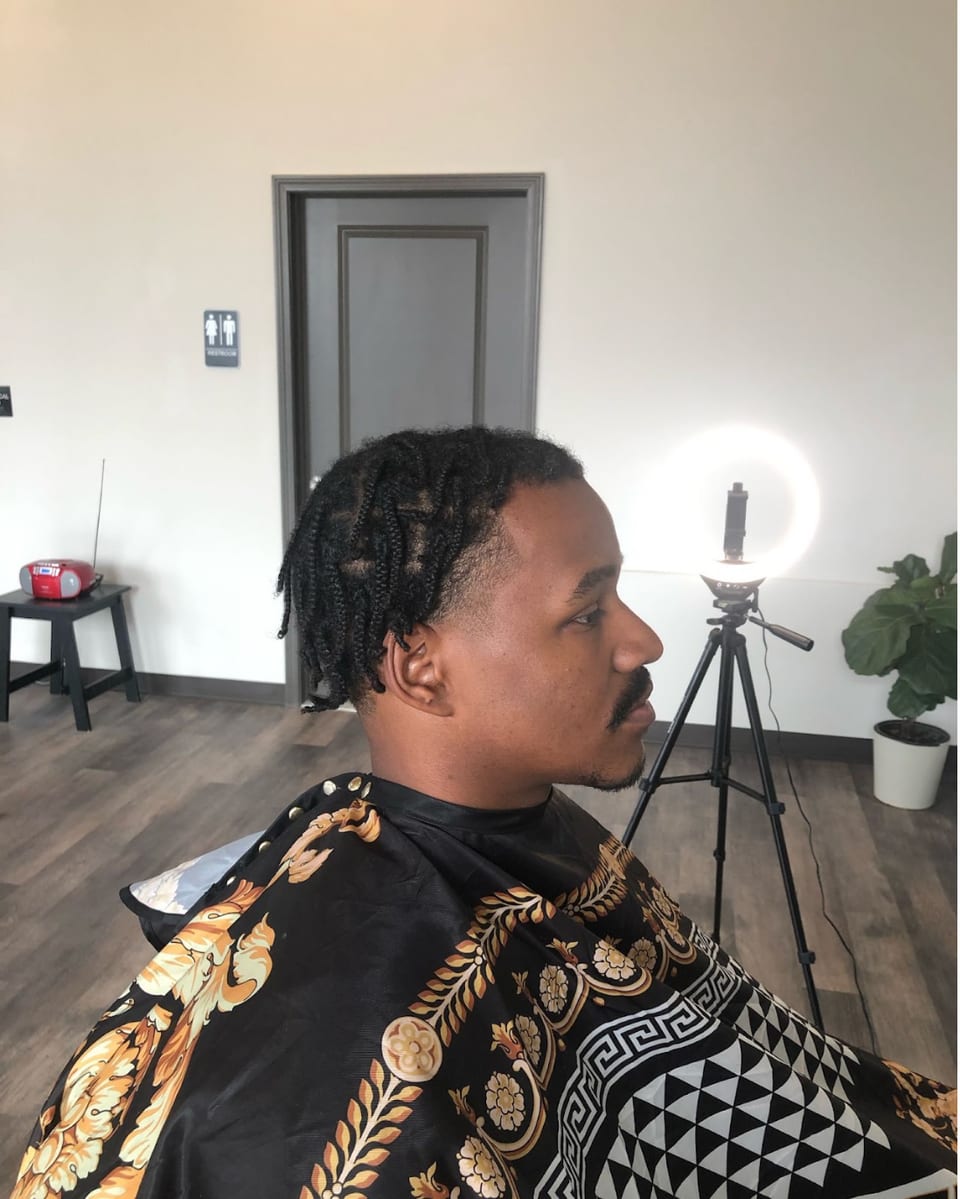 Client profile near the barber station